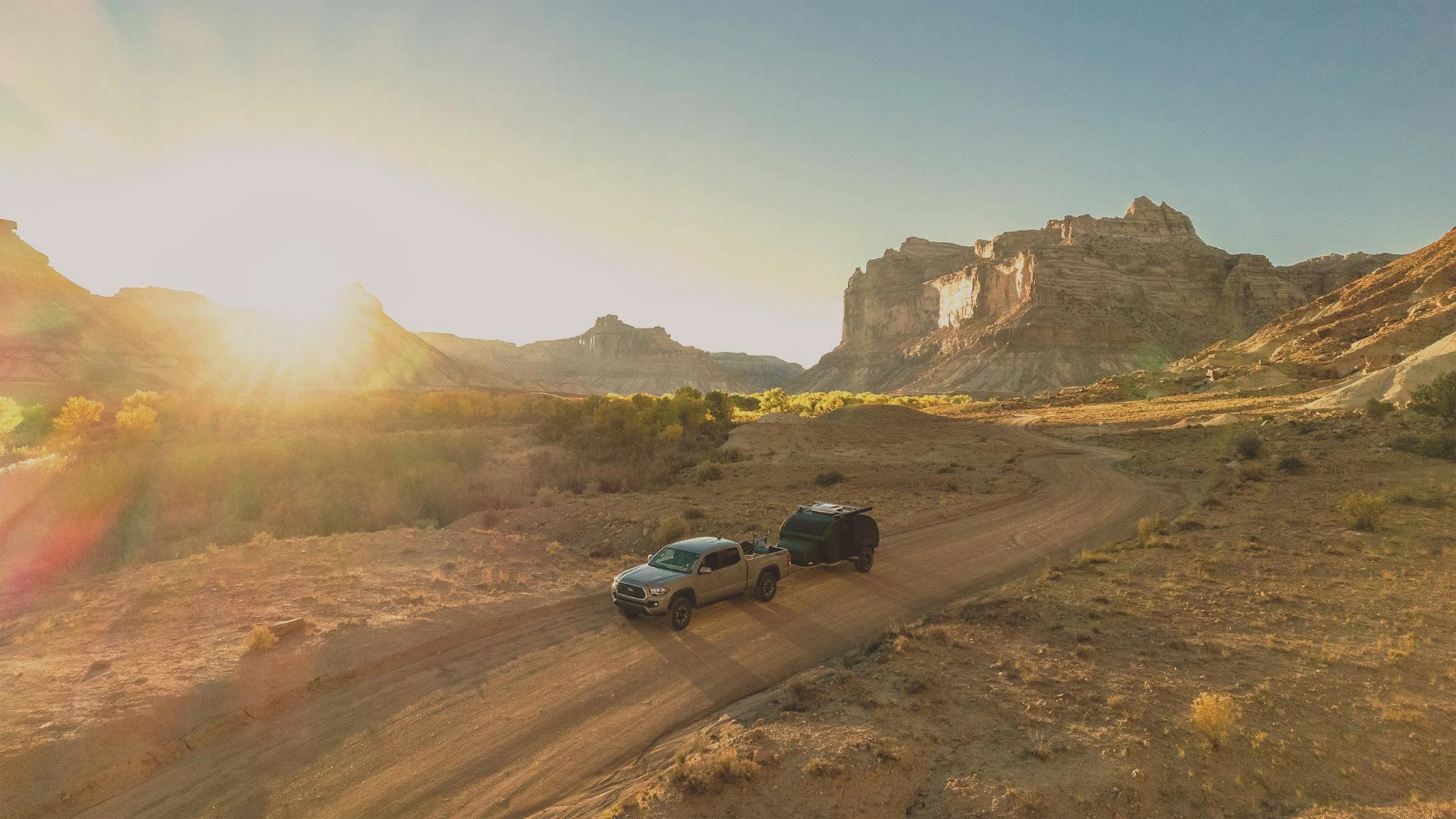 The TOPO2 Voyager being towed by a Toyota Tacoma in the San Rafael Swell.