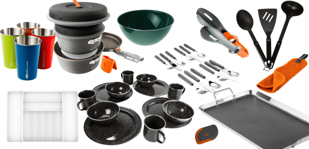 An array of pans, pots, and accesories fit for a camper kitchen.