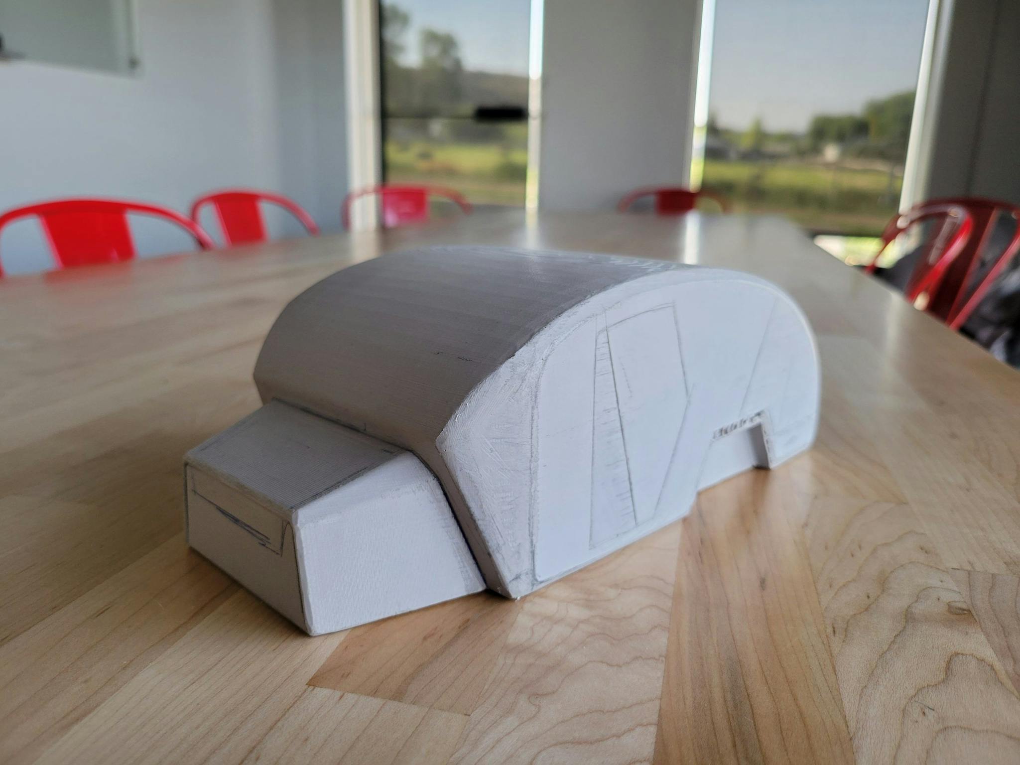 A cardboard prototype of the TOPO2, an offroad camper.