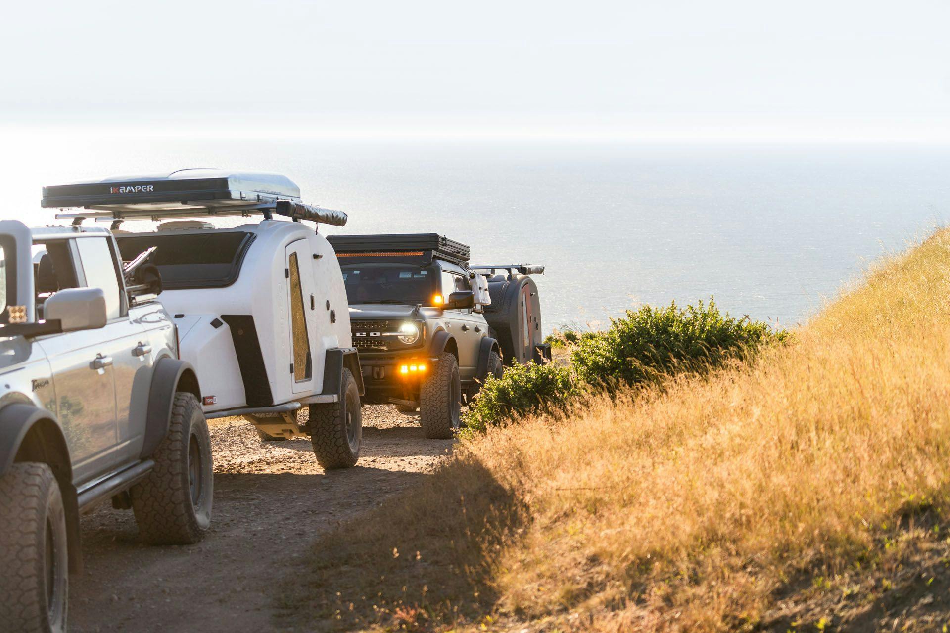 TOPO2s being towed by multiple Bronco vehicles
