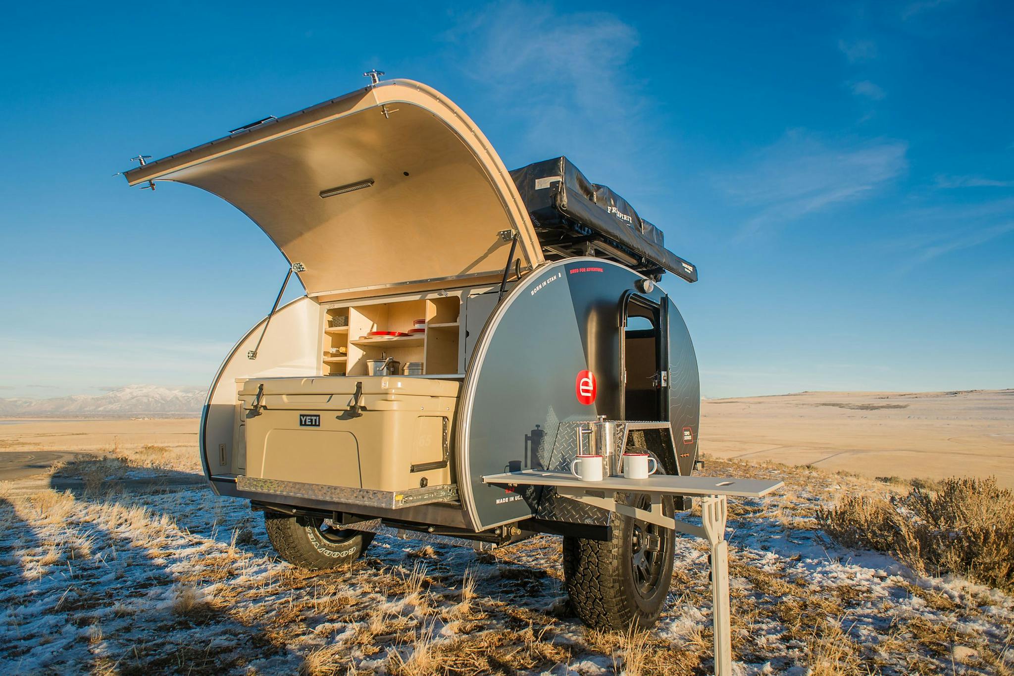 A teardrop camper parked at Antelope Island State Park.