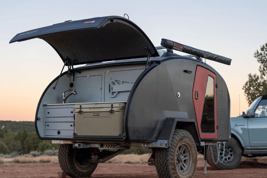 The TOPO2 parked in Gooseberry Mesa, with the rear galley hatch opened showing off the full camp kitchen setup.